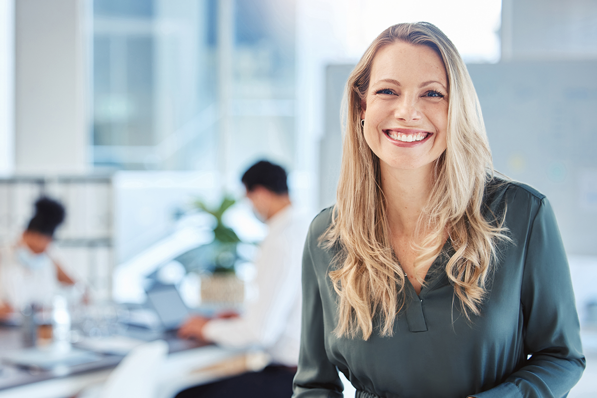 female leader with a smile