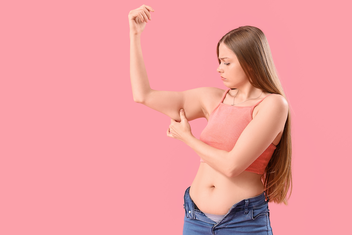 young mom with chubby arms